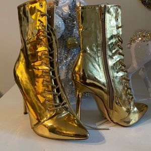 Royalty gold knee high boots